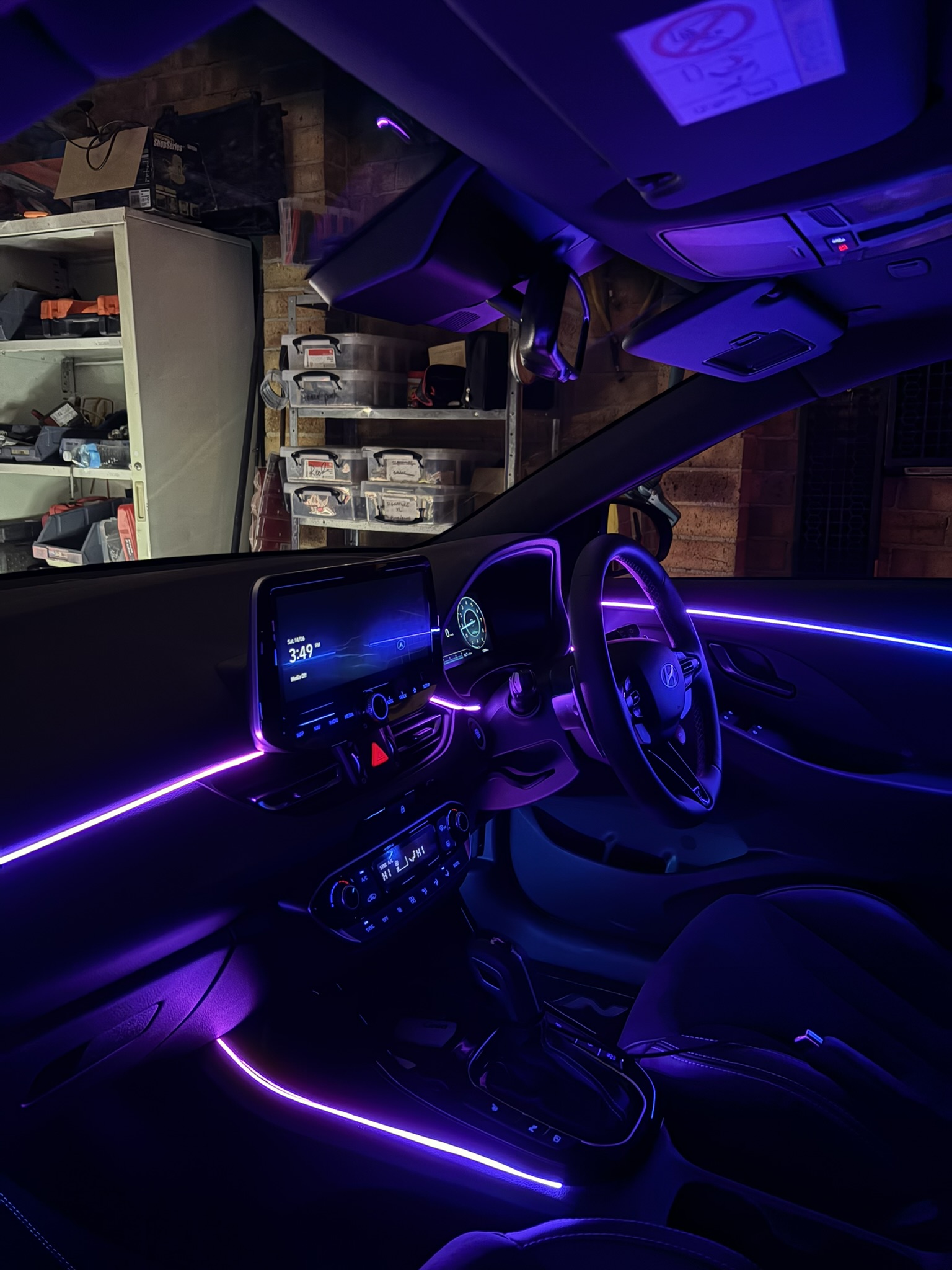 FA Customs interior with purple ambient lighting
